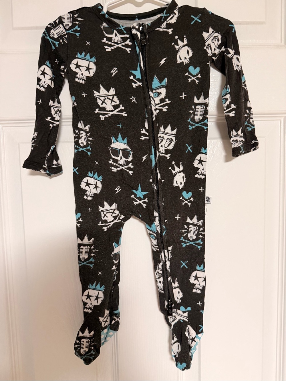 Black Skull Print Footed One-Piece Bamboo Pajamas with Blue Accents